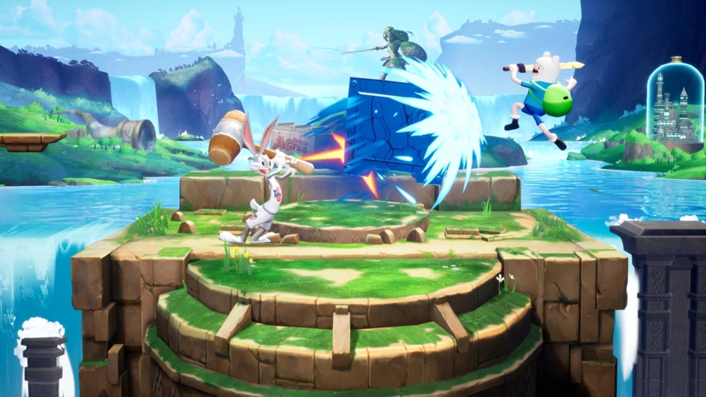 Bugs Bunny, wearing a Space Jam outfit stands on a level themed after Wonder Woman, ginat wooden hammer in-hand. Bugs is sending a giant blue brick flying into Finn from Adventure Time as he jumps to deflect the brick.