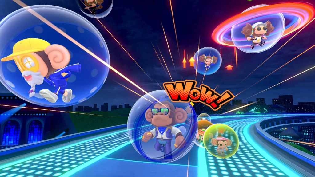 Several monkeys - all of which are in transparent spheres - are running on a track in what appears to be a race. The track is neon blue, and in the background there is a cityscape. 