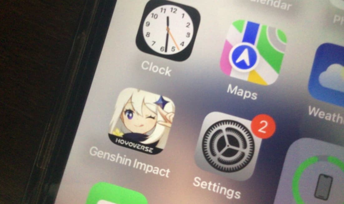 Genshin Impact app on phone screen